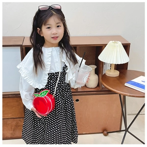 Girl's white ruffle collar shirt with polka dot dress and red apple pearl chain bag