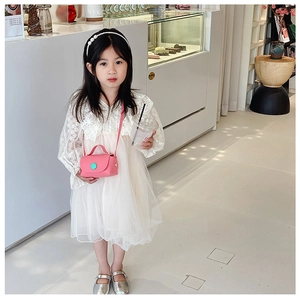 Pink mini PU leather crossbody bag paired with a lace princess dress and pearl headband