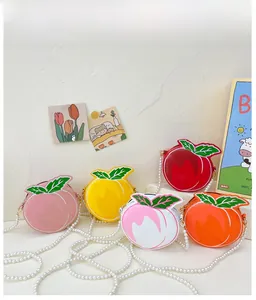 Set of five colorful fruit-shaped mini bags for girls with elegant pearl chain straps