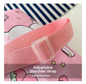 Detail show of pink woven adjustable shoulder strap on cute cartoon bunny canvas bag