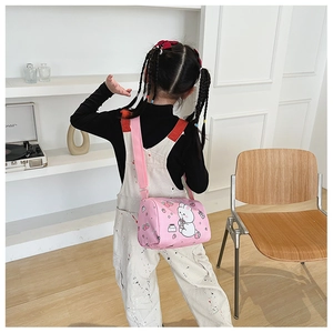 Pink cylinder canvas bag with cute cartoon rabbit design on child model back