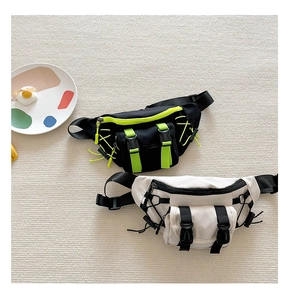 Detail of canvas chest bags for boys with buckle closure and contrast zipper straps