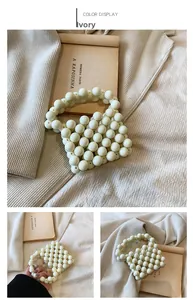 Close-up of handmade cream white beaded mini handbag with elegant pearl texture