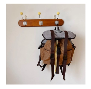 Close-up of lightweight kids canvas backpack with fashion patch and drawstring detail