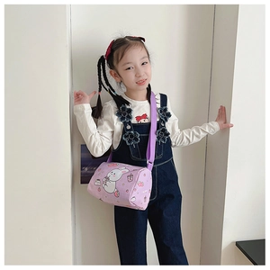 Detail view of purple rabbit canvas cylinder bag for girls with adjustable strap