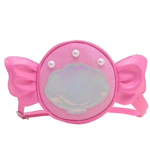Pink glitter crossbody bag for girls with shell sequins and pearly bow wings detail