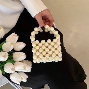 Handmade mini pearl tote bag for girls featuring high-gloss resin beads and a top handle