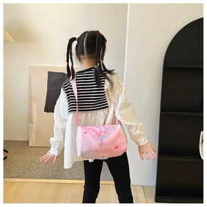 Pink cartoon mermaid crossbody bag for girls with adjustable wide shoulder strap detail