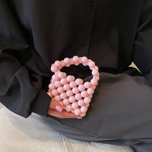 Mini pink beaded handbag for girls with pearl-style round beads and top handle