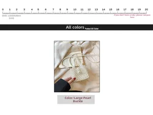 Detail of white pearl woven mini bag featuring a large pearl buckle and beaded strap