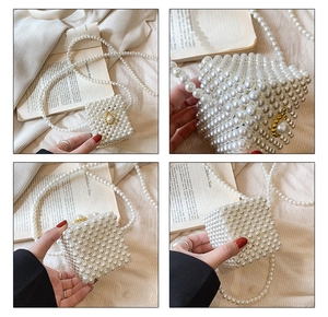 Detail view of mini white pearl woven bag with gold finish rotary pearl lock