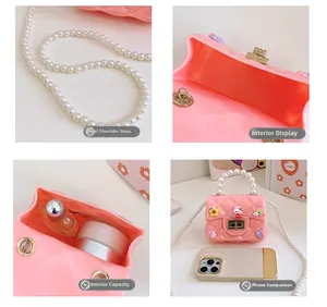 Pink mini jelly bag with pearl handle showing interior space and size comparison details