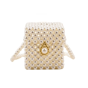 Girls white handmade pearl woven crossbody bag with elegant golden teardrop buckle