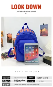Blue nylon school backpack with dimensions 26x33x11cm and orange letter print