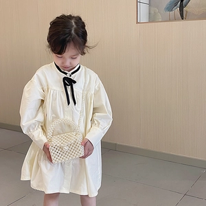 Girl's mini handmade pearl crossbody bag with beaded handle and shoulder chain strap