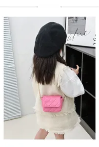 Pink quilted PU leather crossbody bag for girls with gold chain strap and letter logo