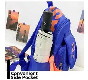 Detail of convenient side pocket on blue school backpack holding a folding umbrella