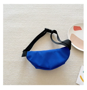 Detail view of Klein blue nylon moon fanny pack with black adjustable strap and buckle