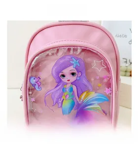 Detail of pink toddler backpack with mermaid cartoon and sparkling glitter sequins