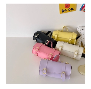 Sacs à main cylindriques en cuir PU pour filles présentés en divers coloris doux
