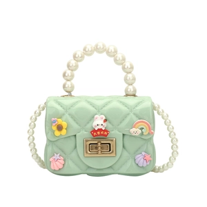 Mint green silicone jelly bag with pearl handle and cute 3D cartoon charms for girls