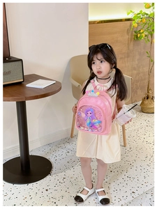 Pink toddler backpack featuring a sequined mermaid window and pearl crown decoration