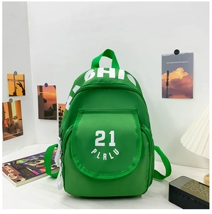 Close-up of vibrant green canvas backpack with white number 21 and letter print detail