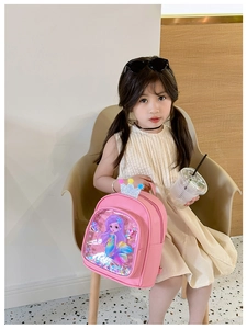Detailed view of pink toddler backpack with mermaid glitter pocket and crown decoration