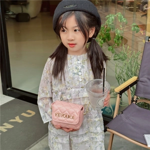 Pink quilted PU leather mini crossbody bag with gold chain strap for young girls
