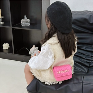 Pink quilted PU leather crossbody bag for girls featuring a gold chain strap and metal logo