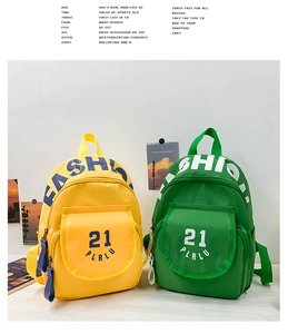 Detailed view of yellow and green kindergarten backpacks with durable nylon material
