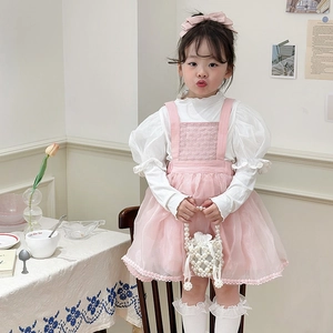 Pink princess tulle dress for girls with white puffy sleeves and pearl chain handbag