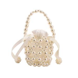 Handmade pearl beaded bucket bag for girls featuring a white drawstring inner pouch
