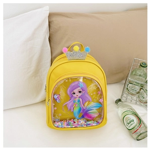 Detail of yellow toddler backpack featuring mermaid print, sequins crown and plush balls