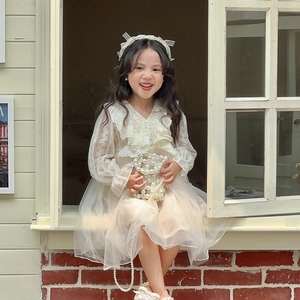 Girl's off-white princess dress with lace embroidery, tulle skirt and pearl accessories
