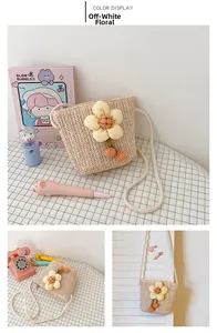 Detail view of cream straw shoulder bag with yellow floral decor for girls