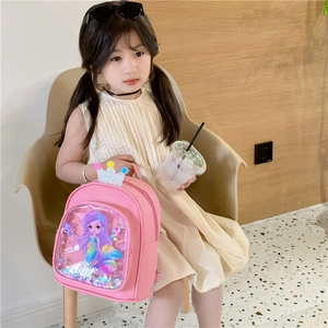 Pink toddler backpack with mermaid print and sequins for girls, worn by little model