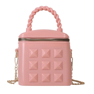 Pink jelly mini handbag with 3x3 gold studs, spiral handle and gold chain strap