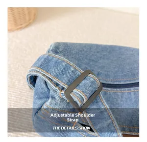 Close-up of adjustable shoulder strap on denim kids bag with durable plastic buckle