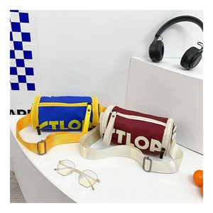 Détails de sacs bandoulière cylindriques colorés pour enfants avec imprimé TLOP