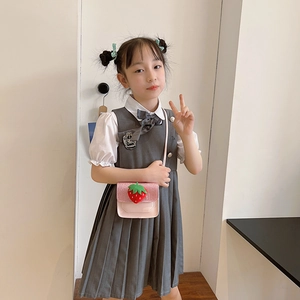 Girls' grey school uniform dress with white puff sleeves and a pink strawberry crossbody bag