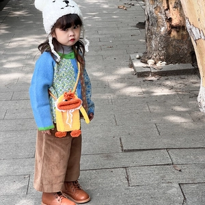 Handmade crochet duck crossbody bag for kids with adjustable colorful strap on model