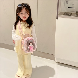 Girl's yellow knit vest and wide-leg pants set with a cute pink doll crossbody bag