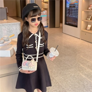 Girls white woven handbag with pearls, floral decor, and a cute rabbit doll pendant