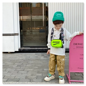 Kids streetwear style with green letter print crossbody bag and matching beanie cap