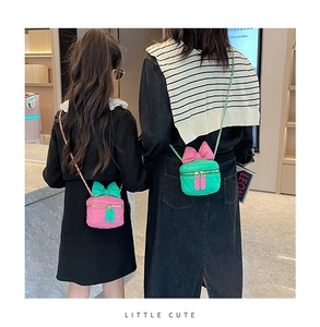 Detail of cute quilted crossbody bags for girls with bow accents and bunny ear zippers
