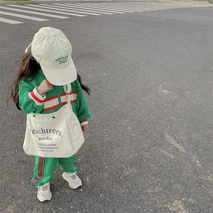 Kids green sports tracksuit with canvas crossbody bag and striped tape detailing