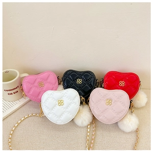 Five heart-shaped mini quilted crossbody bags in varied colors with gold chain straps