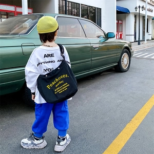 Kids streetwear canvas crossbody bag with letter print and large capacity for boys and girls