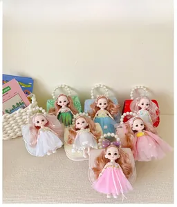 Detail of colorful doll pearl handbags featuring delicate lace dresses and elegant handles